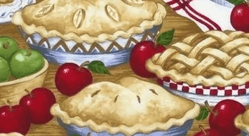 A close up of two pies on top of each other